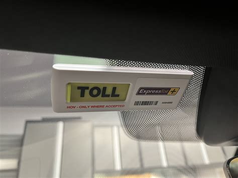 mounting rfid toll tags behind dotted areas|porsche taycan toll tag placement.